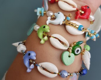 adjustable dolphin bracelet, adjustable bracelets, dolphin bracelet, ocean bracelet, cowrie shell bracelet, pearl, colorful summer bracelets