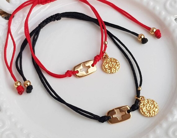 evil eye cross on macrame cord evil eye cross on macrame cord