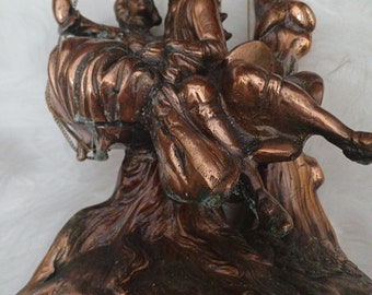 Pareja victoriana de latón balanceándose