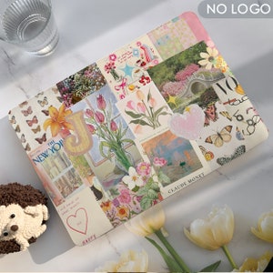 May include: A laptop skin featuring a collage of images, including flowers, a cityscape, a painting by Claude Monet, and a magazine cover. The skin is pink, white, and green.
