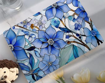 May include: A laptop case featuring a stained-glass floral design in shades of blue and white. The design includes large, stylized flowers with intricate details and a 'NO LOGO' label in the corner. The case is a decorative accessory.