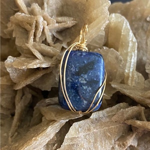 Fanciful rectangular pendant
