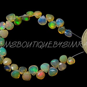 DISCOUNTED PRICE~~30 Pieces~~AAA Grade~~Ethiopian Opal Faceted Hearts Briolettes~~Ethiopian Opal Hearts Briolettes~~5-6mm app.