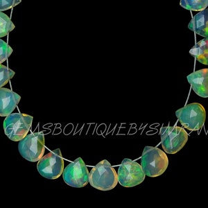 DISCOUNTED PRICE~~23 Pieces~~AAA Grade~~Ethiopian Opal Faceted Hearts Briolettes~~Ethiopian Opal Hearts Briolettes~~6-7mm app.