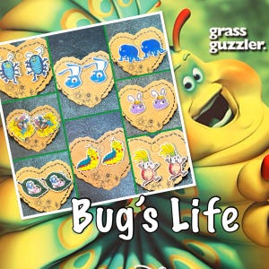 May include: A collection of colorful, heart-shaped earrings featuring cartoon bug characters from the movie "Bug's Life." The earrings are on a white background with the text "Bug's Life" and "grass guzzler."