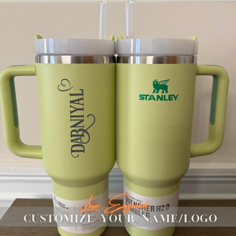 Personalized Stanley 40oz tumbler with engraved birth month flower and custom name. A unique floral birthday gift, perfect for everyday use and special occasions.