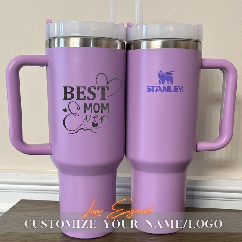 Personalized Stanley 40oz tumbler with engraved birth month flower and custom name. A unique floral birthday gift, perfect for everyday use and special occasions.
