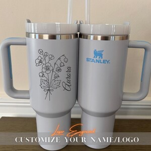 Personalized Stanley 40oz Tumbler, custom engraved for birthdays, bridesmaids gifts, bachelorette parties, or groomsman gifts. This insulated drink bottle keeps beverages hot or cold for hours and includes a handle and straw for convenience. A perfect gift for him, her, or wedding party members, combining style and function. Ideal for celebrations, special occasions, or daily use, offering a unique and thoughtful personalized touch for any recipient
