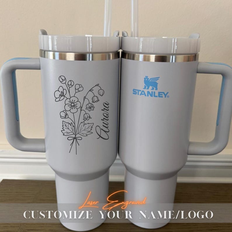 Personalized Stanley 40oz Tumbler, custom engraved for birthdays, bridesmaids gifts, bachelorette parties, or groomsman gifts. This insulated drink bottle keeps beverages hot or cold for hours and includes a handle and straw for convenience. A perfect gift for him, her, or wedding party members, combining style and function. Ideal for celebrations, special occasions, or daily use, offering a unique and thoughtful personalized touch for any recipient