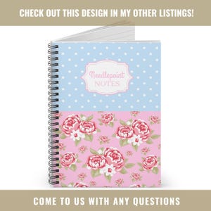 May include: Spiral-bound notebook with a light blue polka dot top half and a pink floral bottom half. The notebook cover has the text "Needlepoint NOTES" in a decorative frame. The notebook is open to reveal lined paper.
