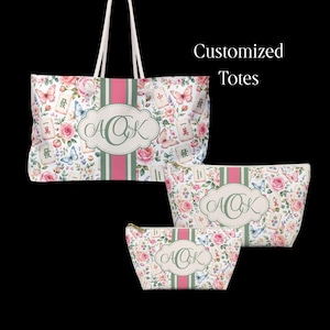 May include: A large tote bag and two smaller pouches featuring a floral pattern with butterflies and mahjong tiles. Each item has a central vertical pink and green stripe with a decorative label containing the monogram AOK in green script.