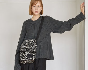 animal print sling bolsa