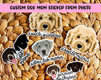 May include: A set of six custom dog mom stickers featuring different dog breeds. The stickers are printed on white paper with black text and feature illustrations of dogs with their breed names and the text "mama" or "grandma".