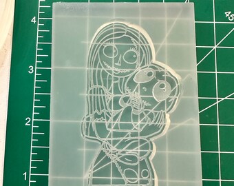 Sally holding baby Jack Keychain Mold