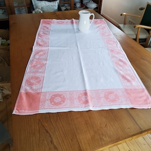 Old rectangular tablecloth, 150 x 90 cm, with border in pink-apricot, damask weaving, vintage, Sunday tablecloth, white tablecloth