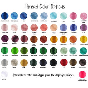 May include: A color chart displaying thread color options, including shades of blue, pink, green, and brown. The text "Thread Color Options" is at the top. The text "Actual thread color may differ from the displayed images" is at the bottom.