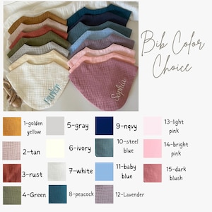 May include: A collection of baby bibs in various colors, including golden yellow, navy, and light pink. Some bibs are embroidered with names. The image also displays a color chart with color names and numbers.