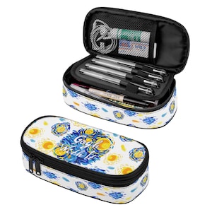 May include: A white pencil case with a blue and yellow starry night print. The case has a zipper closure and the text "Gogh With It" printed on the front.