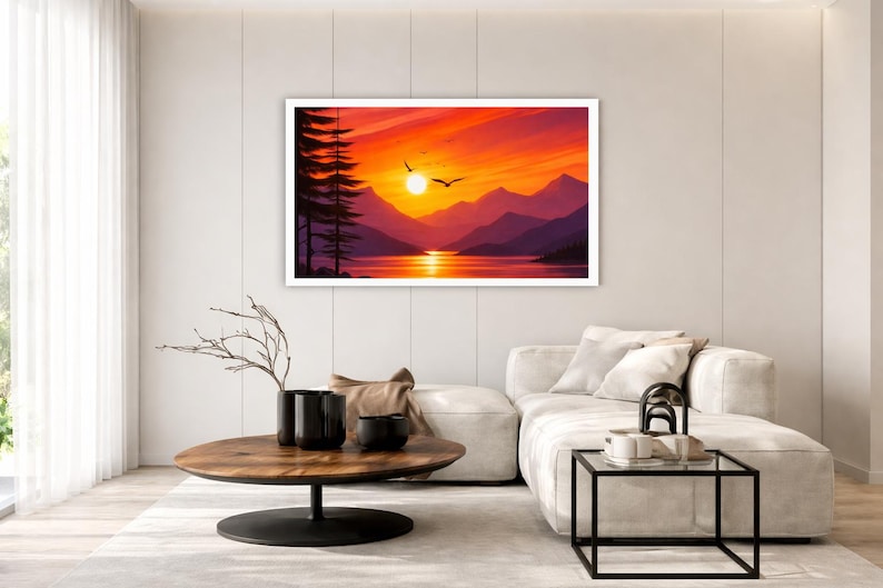 May include: A rectangular wall art print featuring a vibrant sunset over a mountain lake. The scene displays deep purple mountain silhouettes, a bright orange and yellow sky, a calm reflective lake, and dark pine trees on the left with birds.