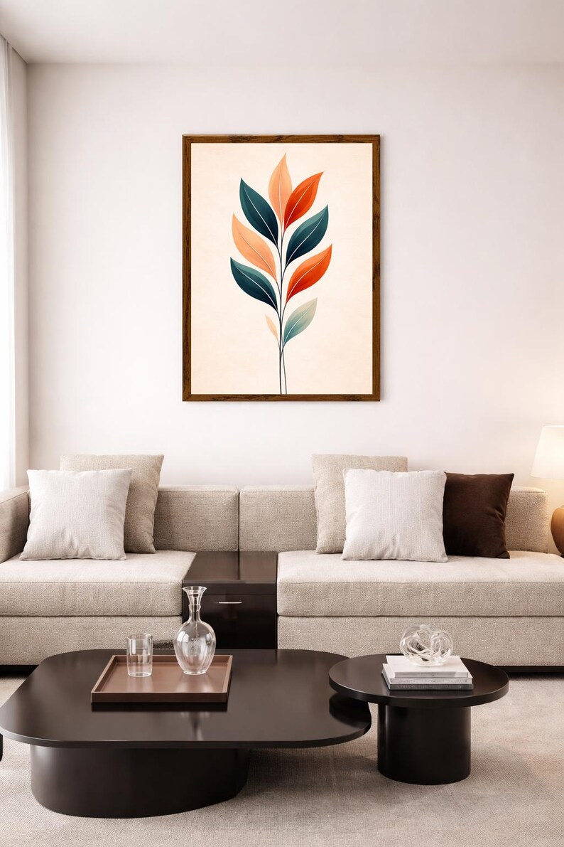 May include: A framed wall art print featuring a vertical botanical illustration of a plant with symmetrical leaves in shades of dark teal, muted orange, and soft peach against a light cream background, enclosed in a simple dark wood frame.