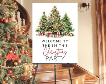 May include: A white sign with a watercolor illustration of three Christmas trees with red ornaments and presents underneath. The sign reads "Welcome to the Smith's Christmas Party". The sign is on a black easel.