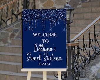 Könnte beinhalten: Blaues Glitzer-Willkommensschild mit dem Text "Welcome to Lilliana's Sweet Sixteen 10.20.23" auf einem weißen Staffelei.