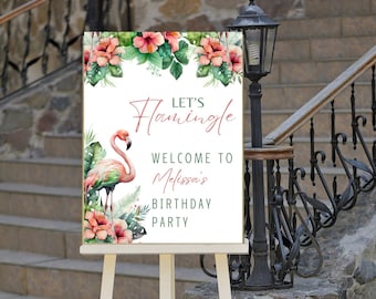 May include: A white sign with a pink flamingo and green tropical leaves. The sign says "Let's Flamingo" and "Welcome to Melissa's Birthday Party".