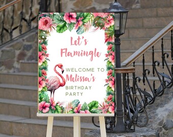May include: A white easel with a sign that says "Let's Flamingle Welcome to Melissa's Birthday Party". The sign is decorated with pink flamingos, tropical leaves, and pink flowers.