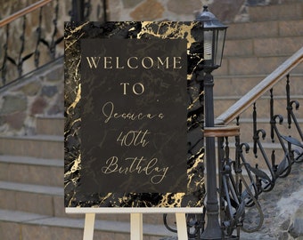 May include: A black and gold welcome sign with a marble pattern. The sign says "Welcome to Jessica's 40th Birthday".