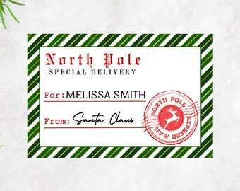 May include: A white gift tag with green and gold stripes. The tag says "North Pole Special Delivery" and has a red stamp that says "North Pole Mail Express" with a reindeer inside. The tag is for Melissa Smith and is from Santa Claus.