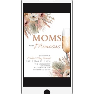 May include: A digital invitation for a Mother's Day brunch with the text "MOMS AND Mimosas" in a pink and gold font. The invitation features a floral design with a glass of champagne. The event is scheduled for Saturday, May 17th at 6 PM at The Lounge Spot, 1256 Street, Riverdale, GA 30296. RSVP to Lynn at 123-456-7890.