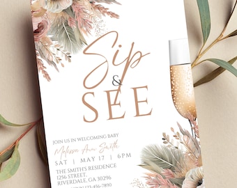 May include: A baby shower invitation with a floral design in shades of pink, beige, and green. The invitation reads "Sip & See" and includes the baby's name, date, time, and location. It also includes the text "RSVP: Lynn 123-456-7890" and "Registered at Target".