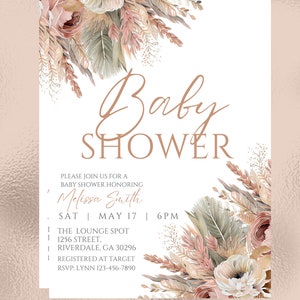 May include: A baby shower invitation with a floral design in shades of pink, beige, and green. The text reads "Baby Shower" in a cursive font and includes the name "Melissa Smith", the date "SAT MAY 17", the time "6PM", the location "THE LOUNGE SPOT", the address "1256 STREET, RIVERDALE, GA 30296", and the RSVP information "RSVP: LYNN 123-456-7890".