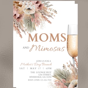 May include: A peach and beige floral invitation with gold glitter accents. The invitation reads "MOMS AND Mimosas" and invites guests to a Mother's Day Brunch on Saturday, May 17th at 6 PM at The Lounge Spot, 1256 Street, Riverdale, GA 30296. RSVP to Lynn at 123-456-7890.