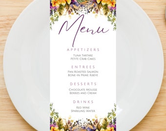May include: A floral menu card with a purple handwritten title "Menu". The menu lists appetizers, entrees, desserts, and drinks. The card is decorated with a watercolor floral border.