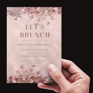 May include: A pink and gold invitation with a glittery background. The text reads "Let's Brunch" and invites you to celebrate Shayla's 40th birthday on August 13, 2022 at 6:30 PM at The Hot Spot, 123 Party St City, ST 12345. Please RSVP by August 10th to Kim 123.456.7890.