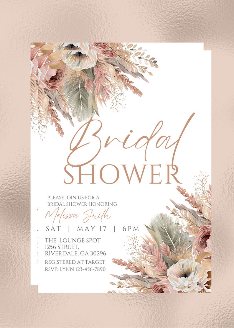 May include: A white invitation with a floral border in shades of pink, beige, and green. The text reads "Bridal Shower" in a copper-colored font. The invitation is for a bridal shower honoring Melissa Smith on Saturday, May 17th at 6 PM at The Lounge Spot, 1256 Street, Riverdale, GA 30296. The bride-to-be is registered at Target. RSVP to Lynn at 123-456-7890.