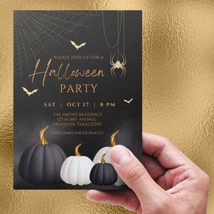 May include: Black and white Halloween party invitation with gold text. The invitation features a spider web, bats, and pumpkins. The text reads "Please join us for a Halloween Party, Sat Oct 17, 8 PM, The Smith's Residence, 123 Scary Avenue, Houston, Texas 12345, Costumes Encouraged."