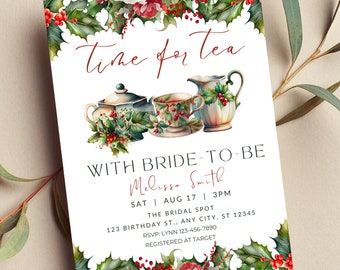 May include: A white invitation with a watercolor illustration of teacups and a teapot decorated with holly and berries. The text reads "Time for tea with bride-to-be Melissa Smith, Sat Aug 17, 3pm, The Bridal Spot, 123 Birthday St., Any City, ST 12345, RSVP: Lynn 123-456-7890, Registered at Target."