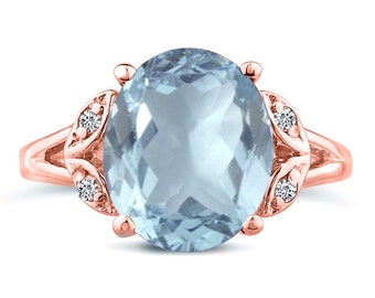 Oval cut aquamarine big gemstone ring in 14k rose gold