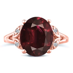 Oval cut garnet big gemstone engagement wedding ring in 14K rose gold.