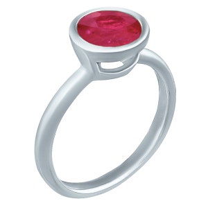 May include: A silver ring with a red ruby gemstone set in a bezel setting.