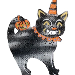 May include: A black cat needlepoint canvas featuring a textured grid pattern. The cat wears an orange and black striped party hat and an orange ruffled collar. A small orange pumpkin with a green stem is positioned near the cat's arched tail.