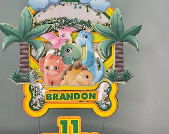 Handgemaakte dinosaurus taarttopper shaker, baby dino-feestje