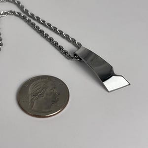 May include: A rustic wooden sign with the text "Welcome to our home" in white lettering. The sign features a distressed finish and a simple, inviting design, perfect for front door decor.