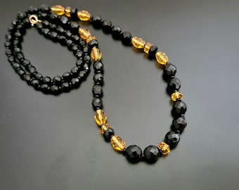 Vintage Graduated Black and Brown Faceted Glass Beaded Necklace with Gold Tone Clasp