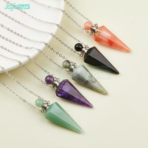 May include: Five crystal point necklaces with silver chains and glass bottles. The crystals are amethyst, green aventurine, labradorite, black obsidian, and rose quartz.