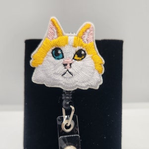 Badge Reel- Orange and White Cat