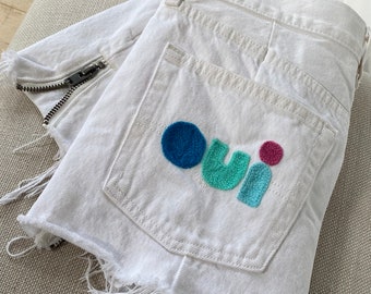 Vintage Levi 501 White Denim Shorts: Embroidered 'Oui' Frayed Cutoffs, Size 24