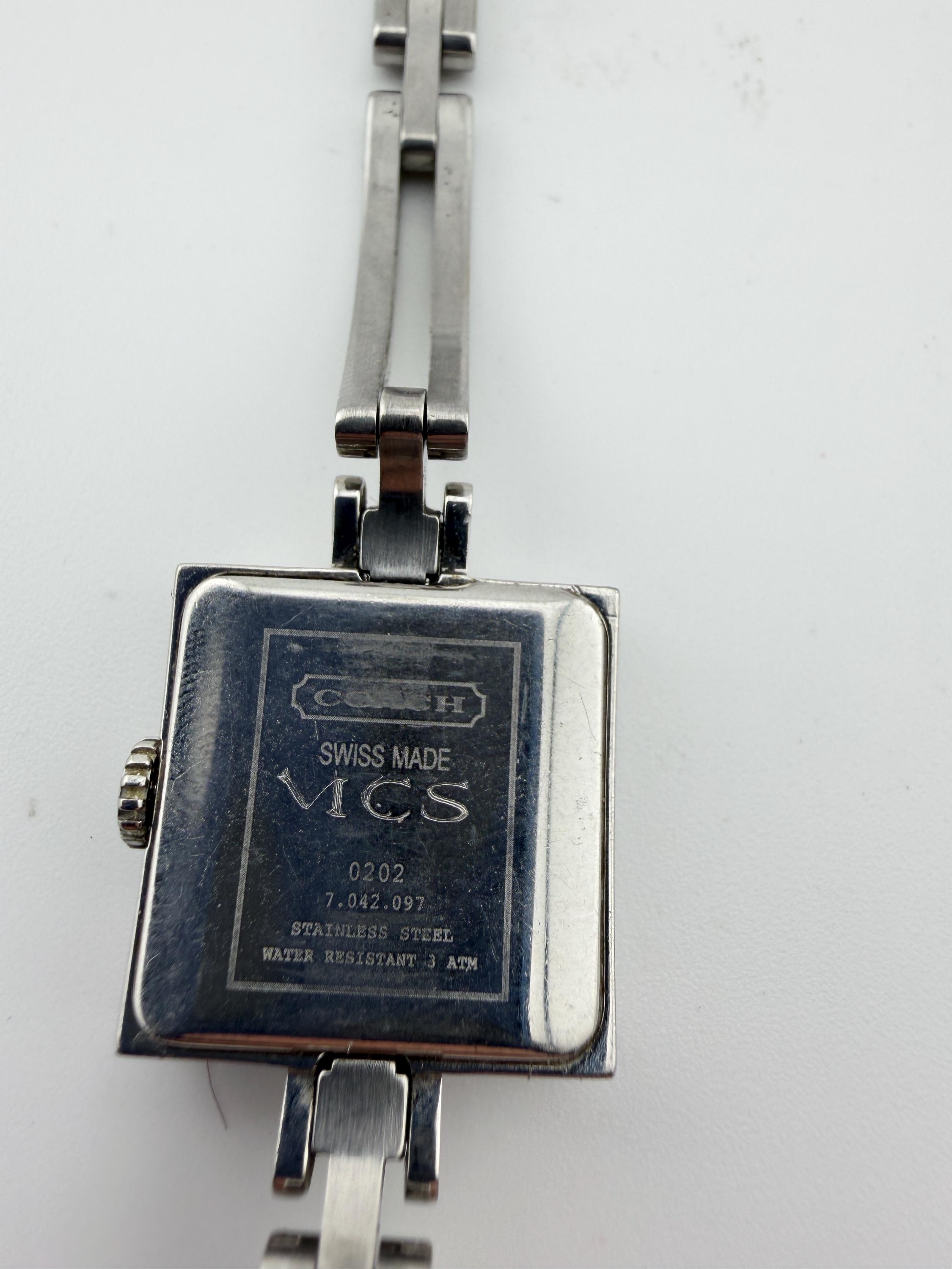 Coach Silver Square Watch with Multicolor Striped Band Amazon.com: Coach Cass Women main image 2